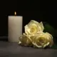 Odlazak mlade osobe Gospodinu u zagrljalj, svijeća i bijele ruže